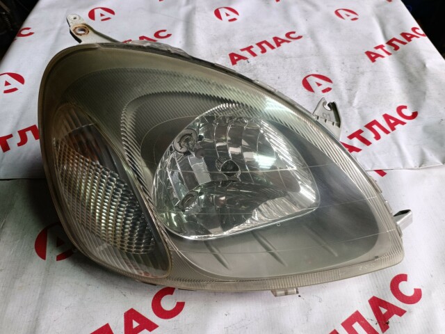 Фара TOYOTA Vitz 