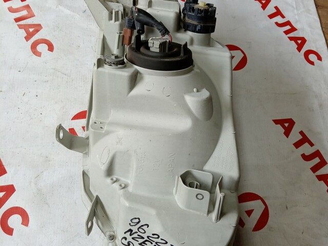 Фара TOYOTA Corolla Fielder 