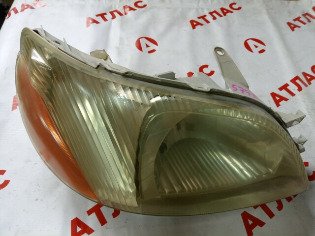 Фара TOYOTA Platz 