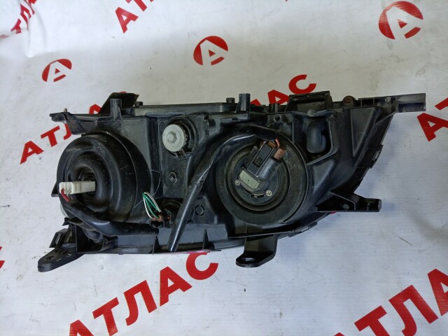 Фара TOYOTA Caldina 