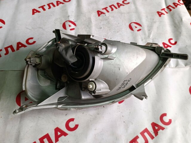 Фара TOYOTA Vitz 