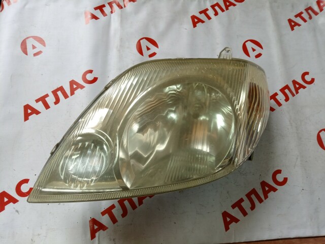 Фара TOYOTA Corolla Fielder 