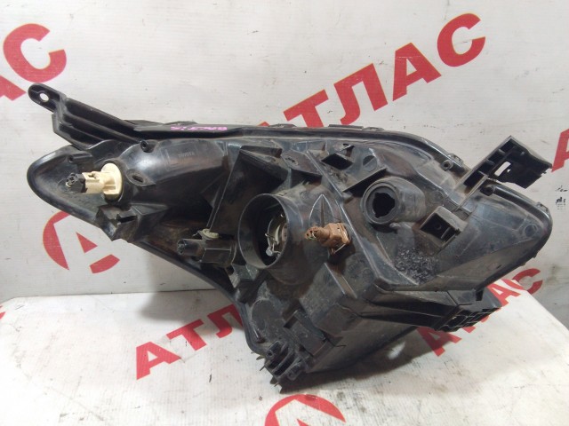 Фара TOYOTA Ractis 