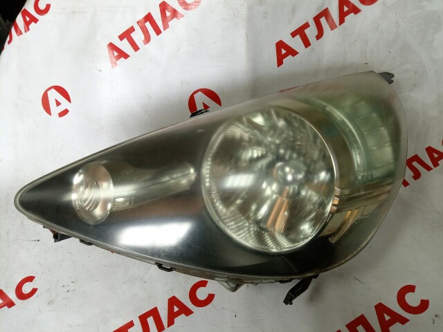 Фара HONDA Fit 